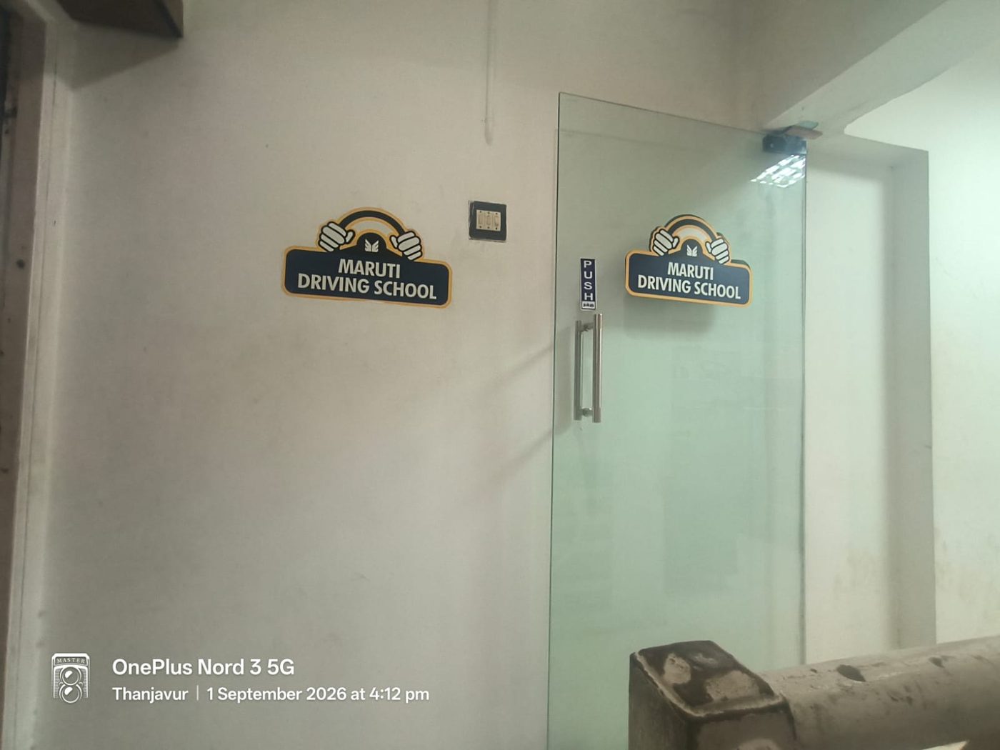 Maruti Driving School branding at the reception entrance